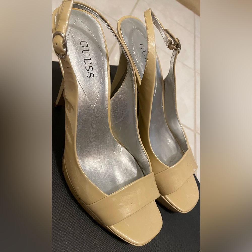 Peep toe slingback heels.